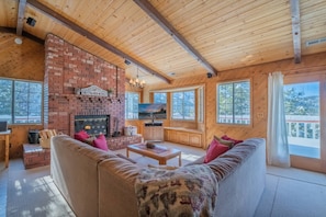 Flat-screen TV, fireplace, foosball