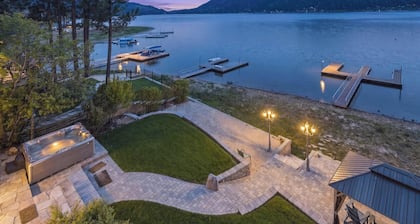 Over 5,700 Square Feet of Lakeside Luxury! Private Dock! Hot Tub! Game Room! Arcade Room! Beach! Patio Gazebo! Ornate Iron and Marble Accents!