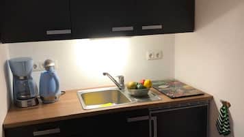 Fridge, coffee/tea maker, electric kettle, toaster