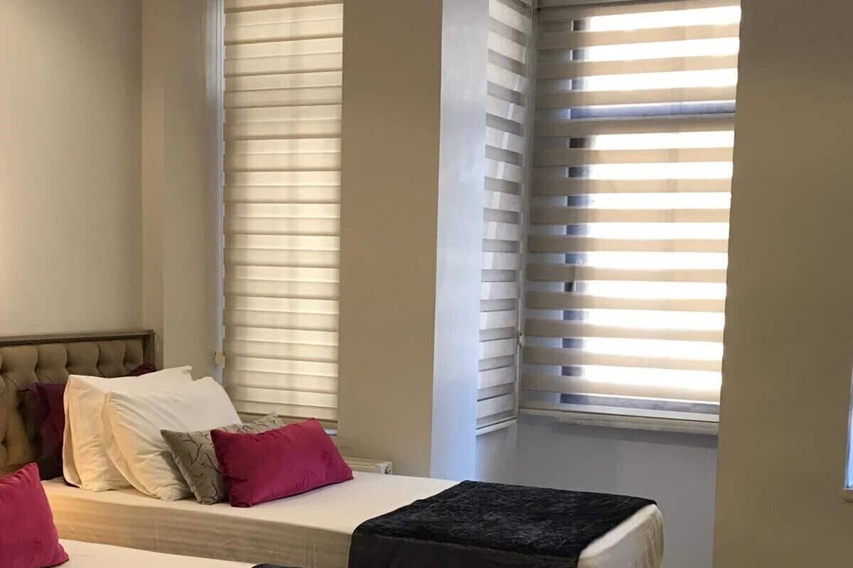 Suíte estúdio família | 1 quarto, roupas de cama premium, frigobar, cofres nos quartos