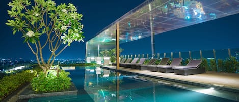Outdoor pool, pool umbrellas, pool loungers