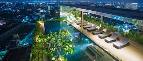 Outdoor pool, pool umbrellas, pool loungers