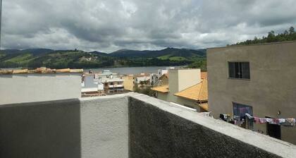 House located in the Center and near the edge of the dam