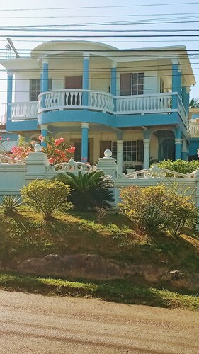 My place is  house with jacuzzi near YSFall. Black river Safari. Pelican bar .