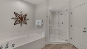Combined shower/tub, jetted tub, towels, soap
