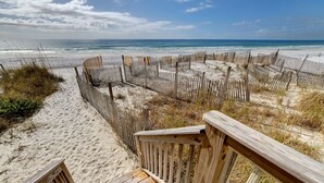 A wooden boardwalk leading to a beach with a wooden fence. - Gulf Front in Seagrove ~ Amazing Views + Free Attraction Tickets! (Santa Rosa Beach)