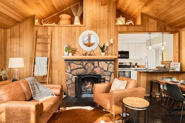 Living Room- sofas, seating areas, wood-burning fireplace, tv