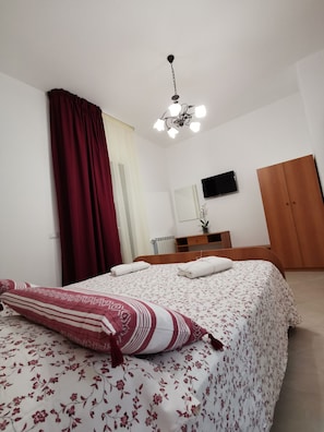 Doppelzimmer | Hochwertige Bettwaren, Daunenbettdecken, individuell dekoriert