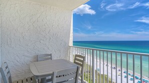 Outdoor dining - Modern Gulf Front Condo, Private Beach Access, Beach Service + Free Tickets! (Santa Rosa Beach)