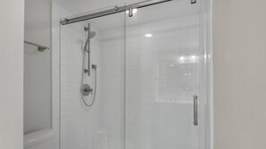 Combined shower/tub, hair dryer, towels, soap
