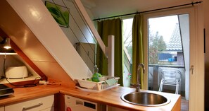 Fridge, microwave, dishwasher, coffee/tea maker