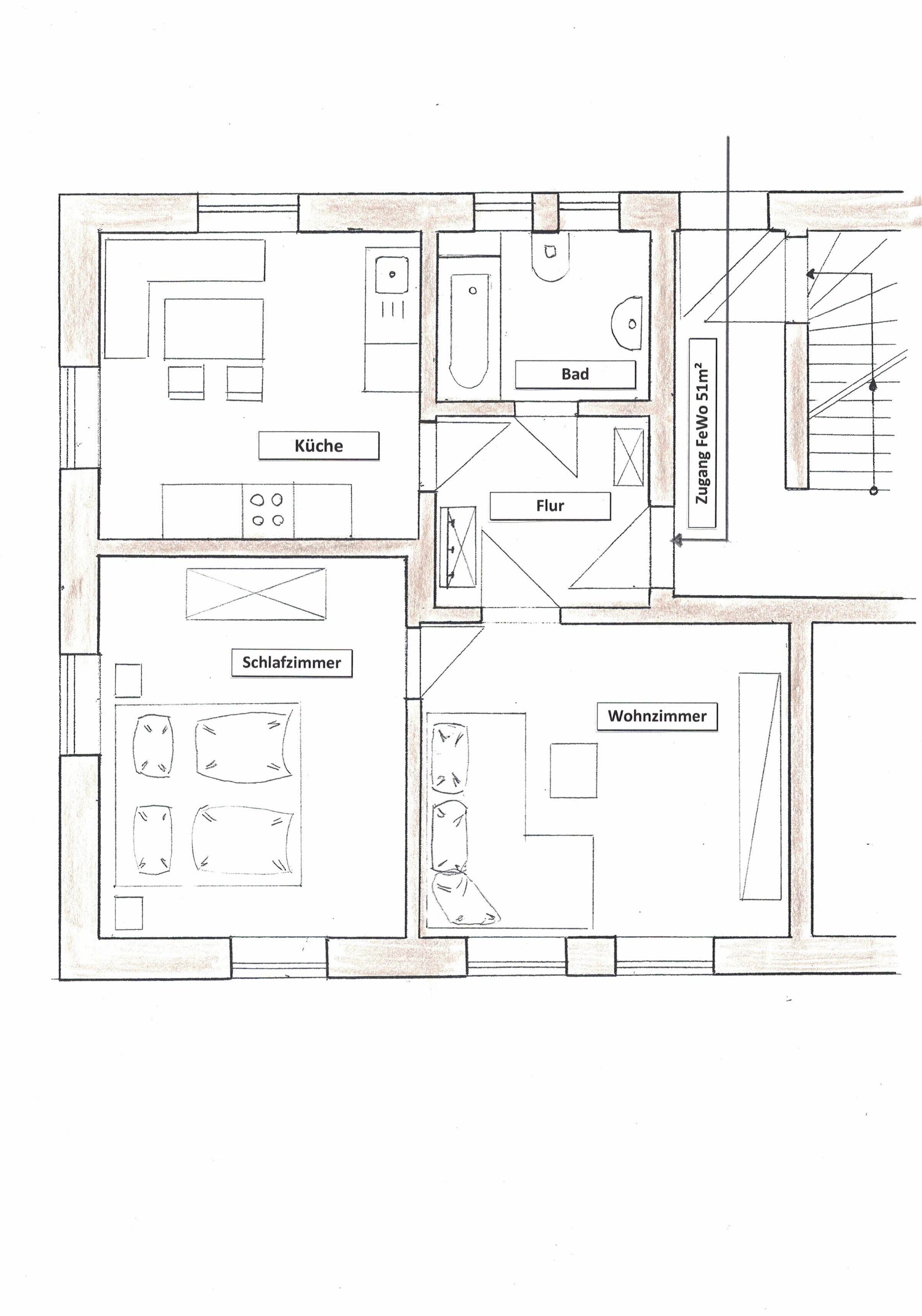 Un plan d’étage d’une maison indiquant les différentes pièces : cuisine, salle de bain, salon, chambre et salle de bain.