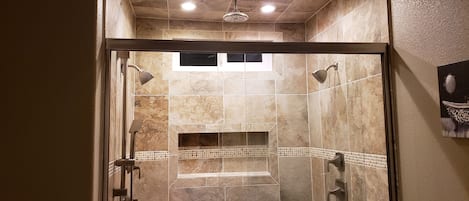 Combined shower/bathtub, hair dryer, towels, soap