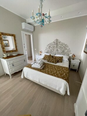 2 dormitorios, tabla de planchar con plancha, wifi gratis y ropa de cama