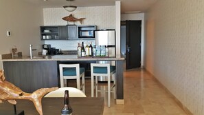 Fridge, microwave, stovetop, coffee/tea maker