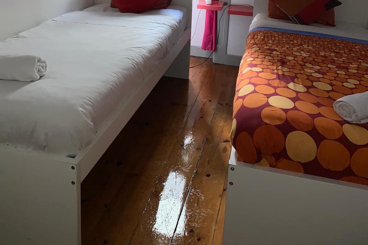 Basic Twin Room, Shared Bathroom | WiFi (free), bed sheets