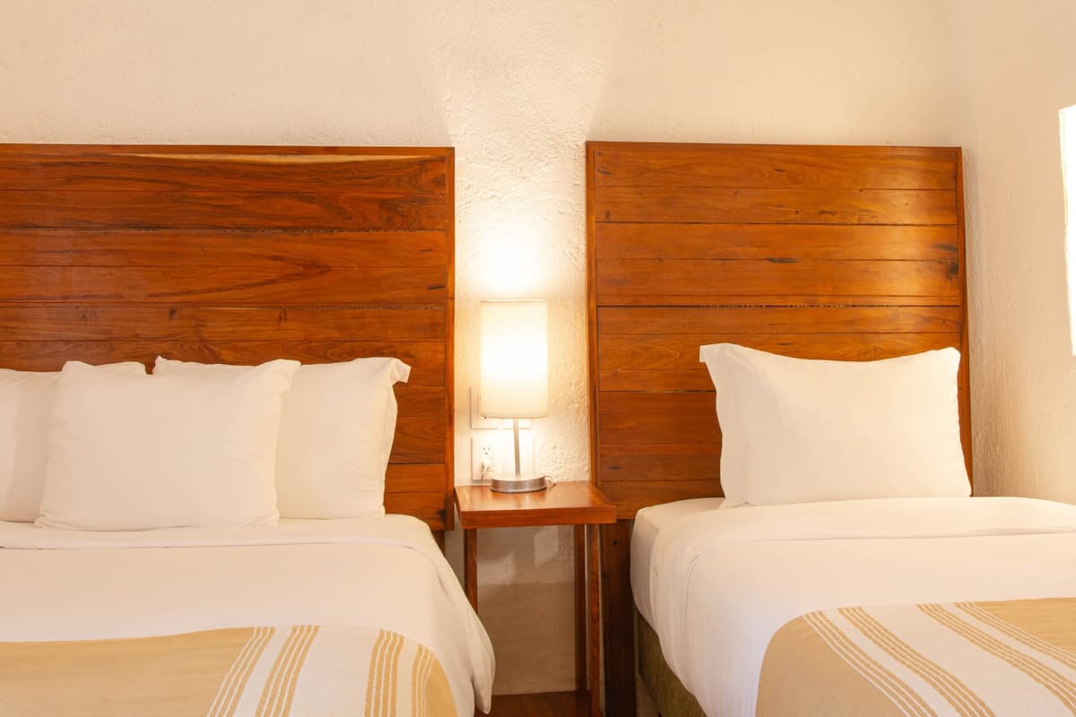 family room | 2 bedrooms, premium bedding, pillow-top beds, minibar