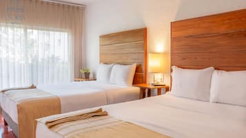 Suite superior | Ropa de cama de alta calidad, camas con pillow-top y minibar