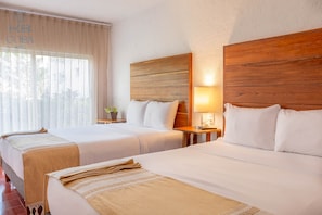 Ropa de cama de alta calidad, colchones con pillow-top y minibar