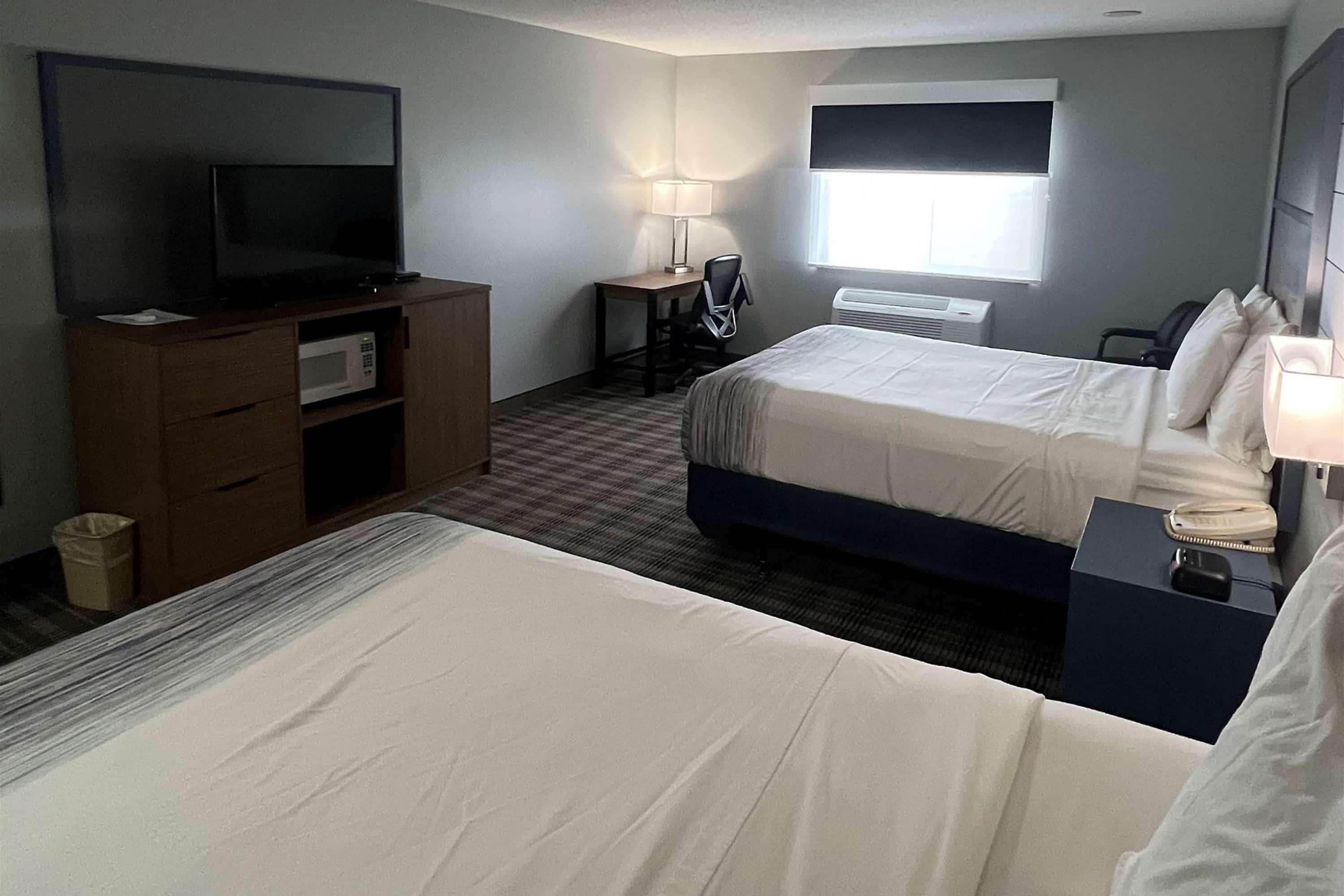 เตียงพร้อมฟูกเสริมที่นอน, โต๊ะทำงาน, พื้นที่ทำงานแบบใช้แล็ปท็อป