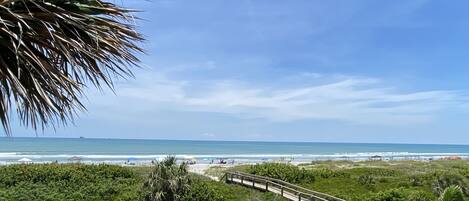 On the beach, sun loungers, beach towels