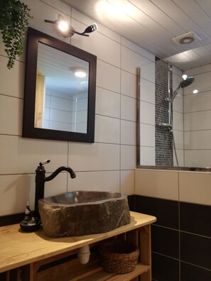 Bathtub, hair dryer, towels, soap