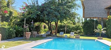 2 outdoor pools, open 6:30 AM to 6:30 PM, sun loungers