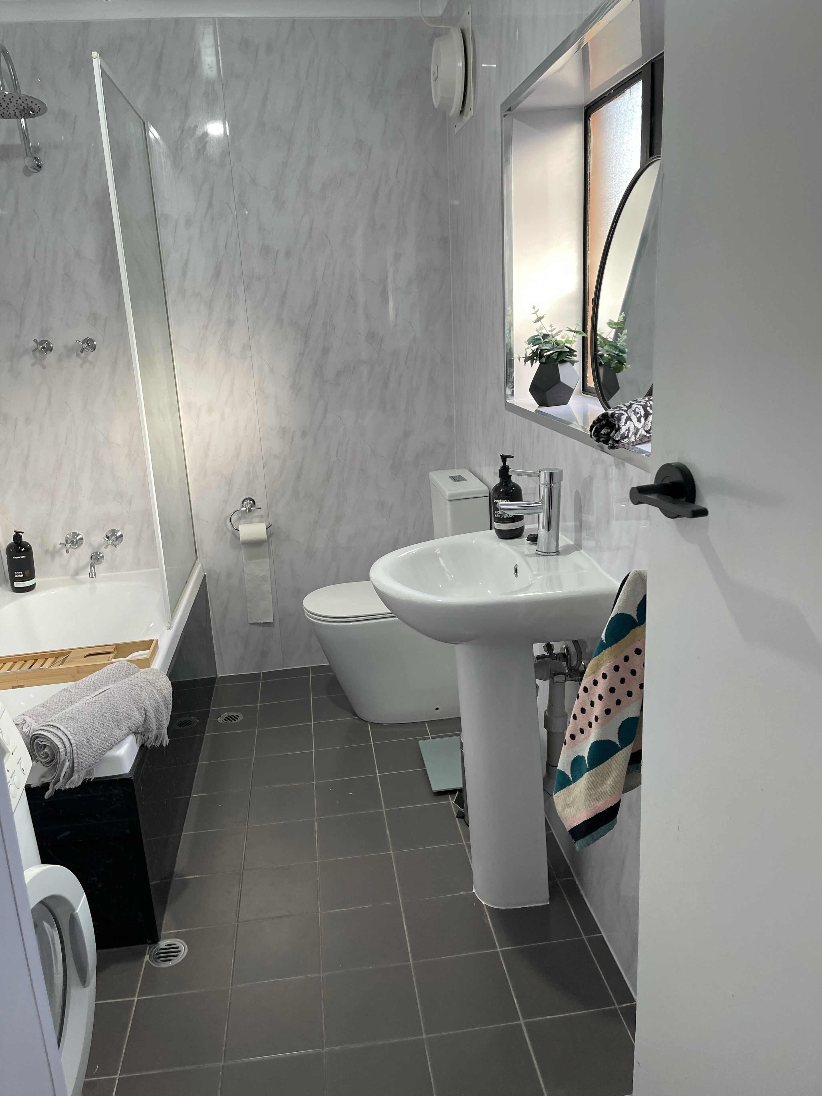 Combined shower/bathtub, hair dryer, towels, soap