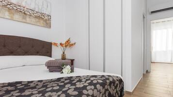 2 dormitorios, tabla de planchar con plancha, Internet y ropa de cama