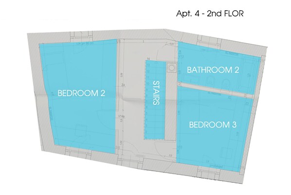 Un plan d’étage architectural en 3D de l’appartement numéro 4, situé au deuxième étage, mettant en évidence la chambre 2, la salle de bain 2, la chambre 3 et l’escalier.