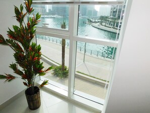 Apartment, 2 Bedrooms, Marina View, Ground Floor | Living area | LCD TV - Luton Vacation Homes Continental Tower (Dubai)