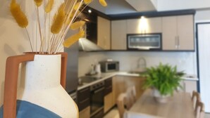 Coffee/tea maker, fridge, microwave, oven
