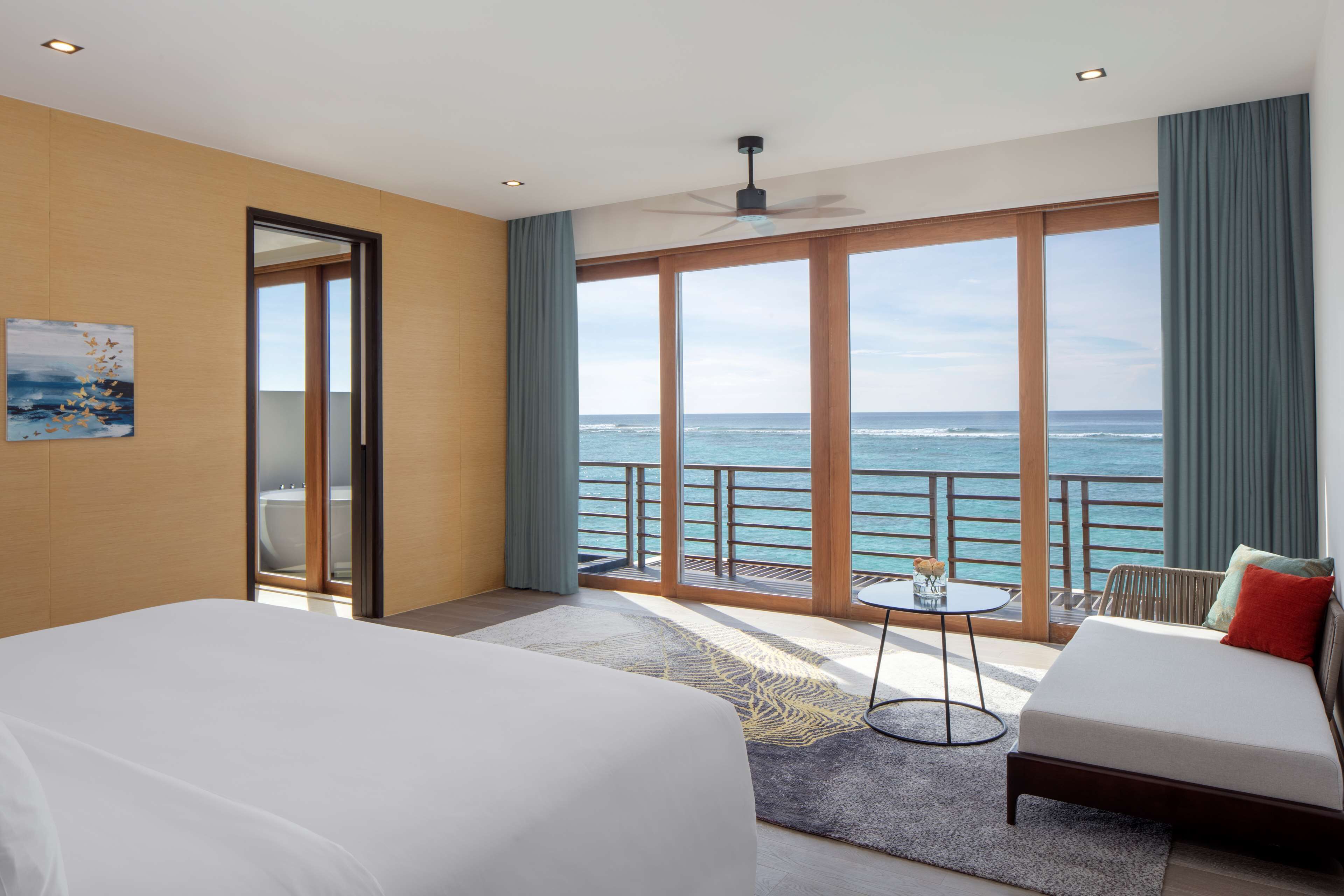 presidential three bedroom over water pool villa with free access to vip seaplane lounge on arrival | bathroom shower