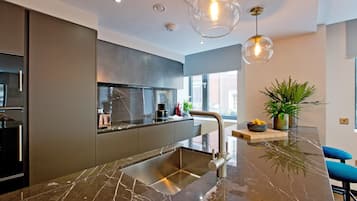 GS4 - 2 Bed Deluxe | Living area | Flat-screen TV, Netflix, heated floors, streaming services