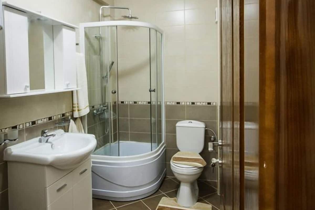 bathroom | shower, free toiletries, hair dryer, dressing gowns
