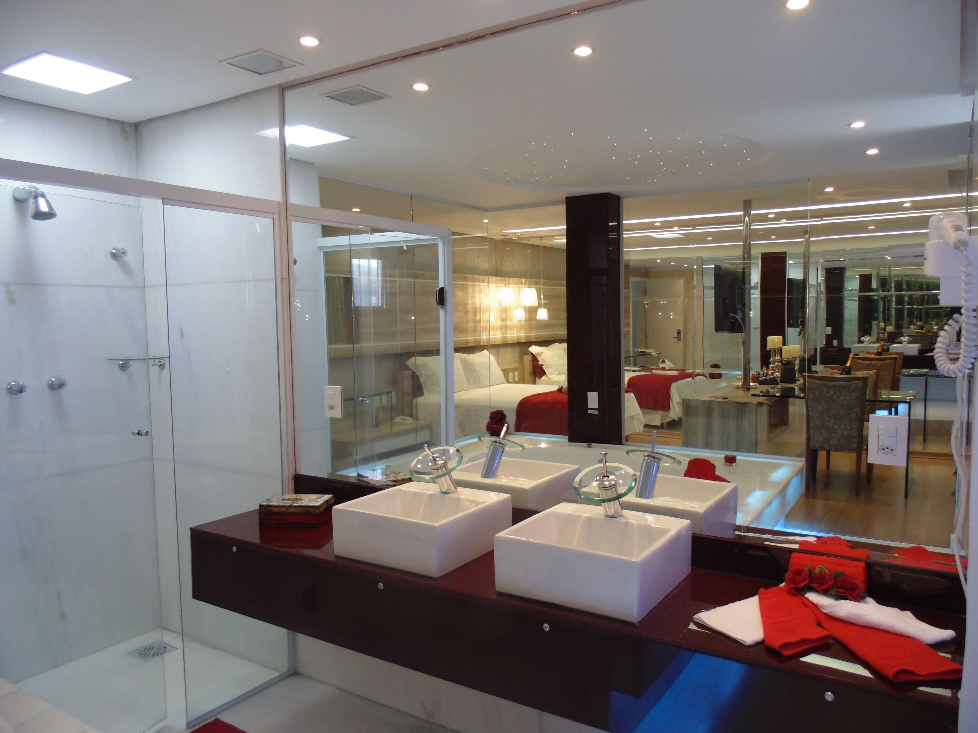 luxury studio suite | bathroom | shower, free toiletries, towels, soap