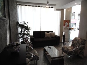 32-inch flat-screen TV with satellite channels, TV