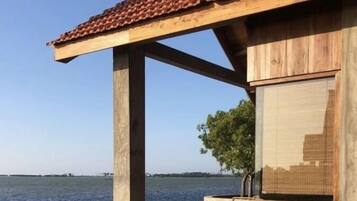 Bungalow, Garden View | 1 bedroom, individually decorated, individually furnished, bed sheets