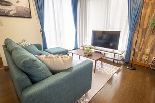 บ้านพัก, 1 ห้องนอน | ห้องนั่งเล่น | ทีวีจอแบน