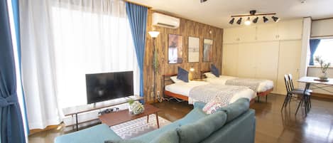 Casa, 1 habitación | Zona de estar | Una televisión de pantalla plana