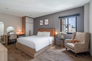 Superior Double Room | Living area | 40-inch flat-screen TV with cable channels, TV - SAZI Resin Hotel - Free Nails/HairWash (Ho Chi Minh City)