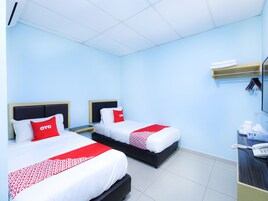 Habitación estándar con 2 camas individuales | Wifi gratis y ropa de cama