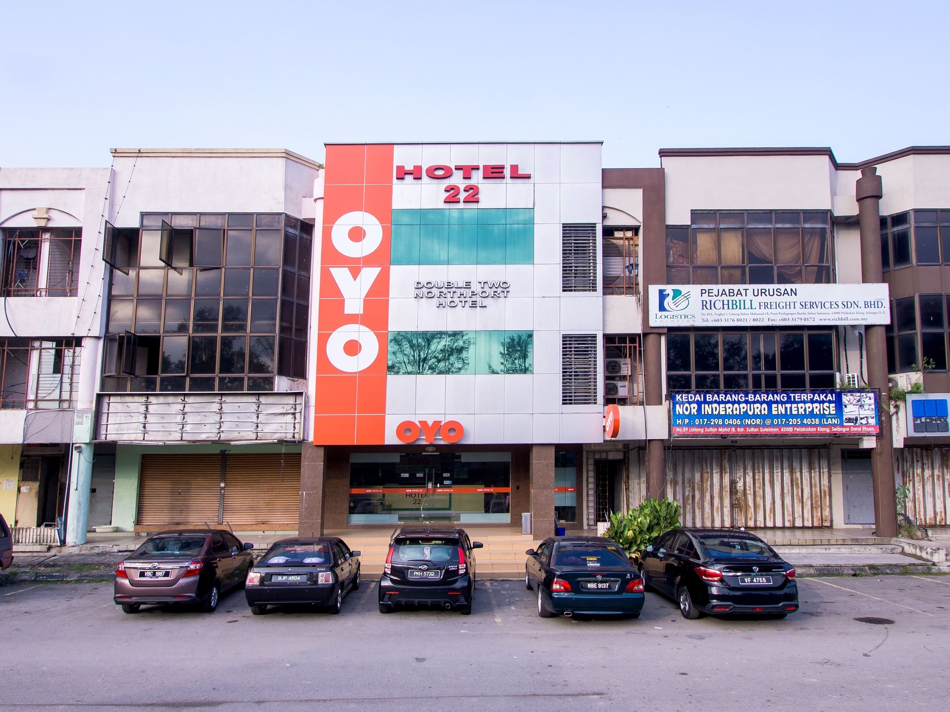 A hotel with a prominent sign indicating it is a double-towered structure.