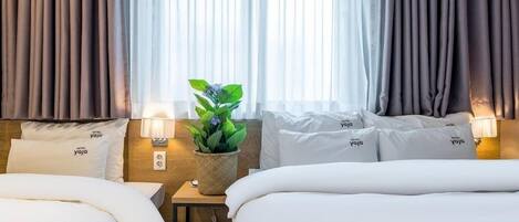 Chambre Deluxe avec lits jumeaux | Décoration personnalisée, ameublement personnalisé, Wi-Fi gratuit