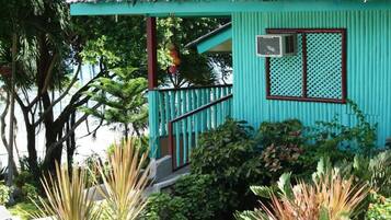 Family Room, 2 Double Beds, Sea View | Individually furnished