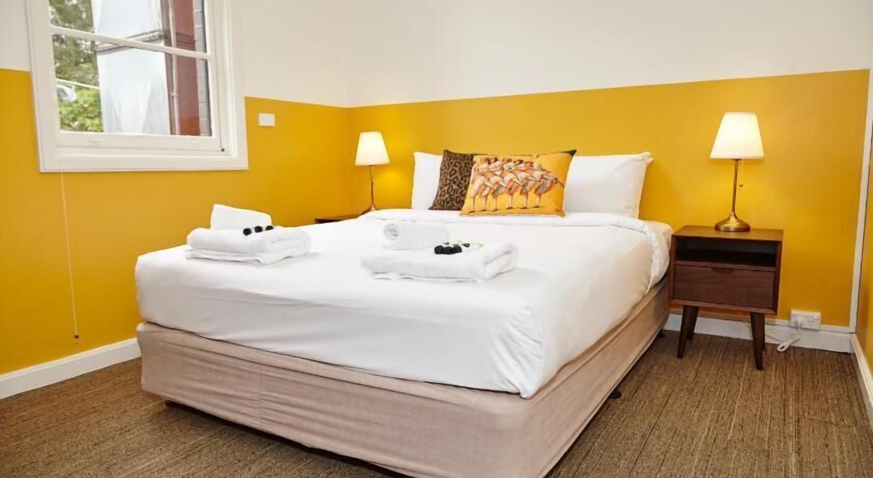 Premium bedding, blackout drapes, iron/ironing board, WiFi