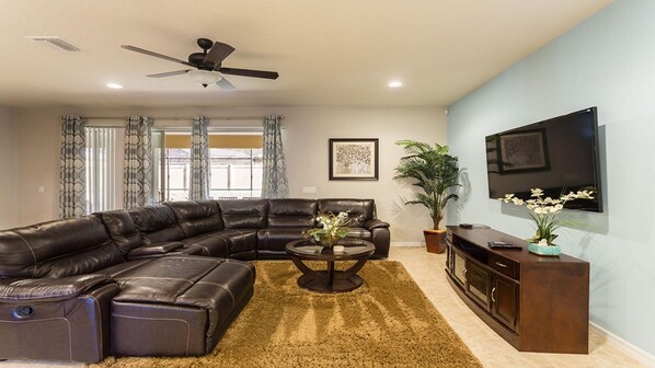 Flat-screen TV, video games, DVD player, table football