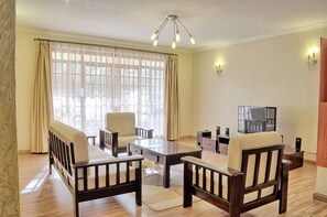 Exclusive Double Room, 2 Bedrooms | Living area | 42-inch flat-screen TV with cable channels, TV, Netflix