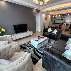 Executive-Suite, 2 Schlafzimmer, mit Bad, Stadtblick | Wohnbereich