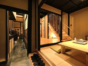 Private Vacation Home | Living area | Flat-screen TV - Tsumugi Hachijominamotocho (Kyoto)